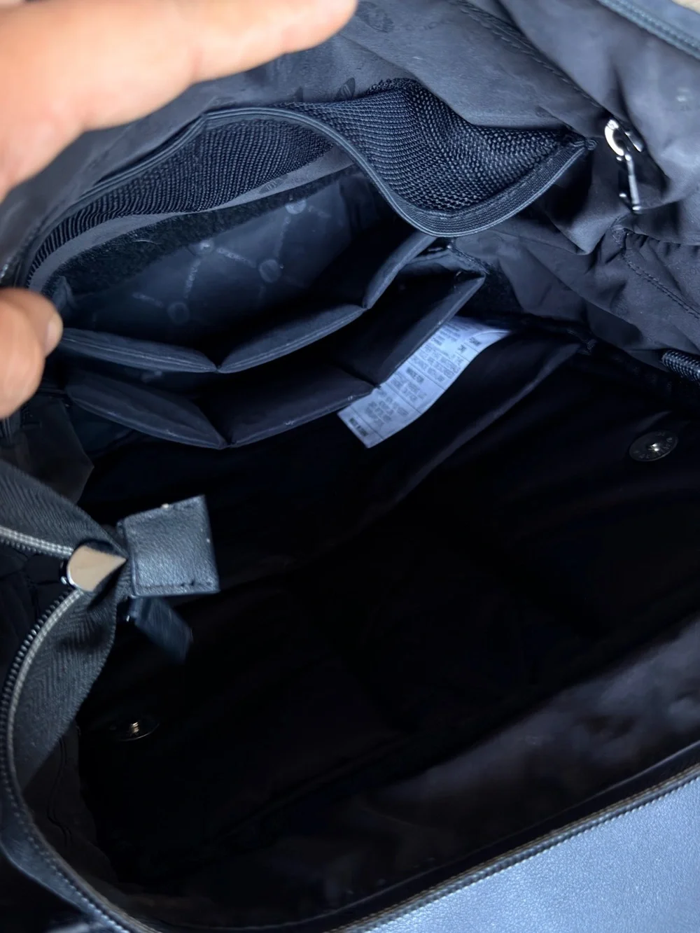 Black Quilted Roll-Top Backpack - [Brand]